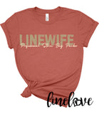 Clay colored tee with the word LINEWIFE in tan and professional storm bag packer in cream